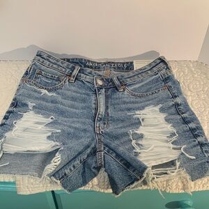 American Eagle Outfitters Ripped Light Blue Jean Shorts
